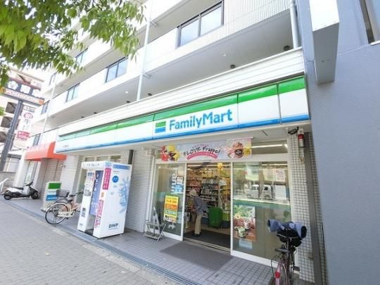 【周辺】　ファミリーマート十三塚本店:210m
